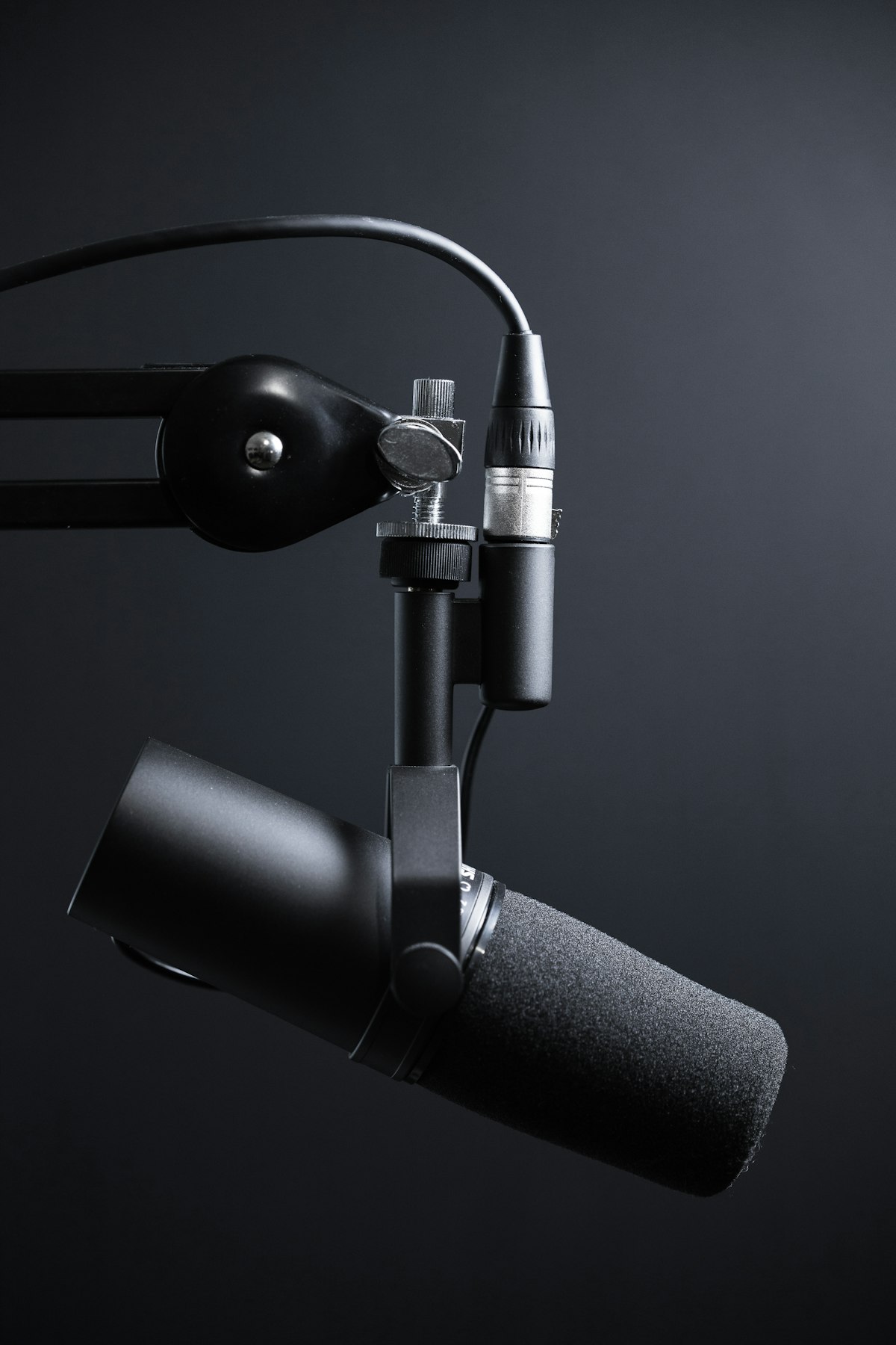 Professional podcast microphone — the setup behind AI's most influential long-form conversations
